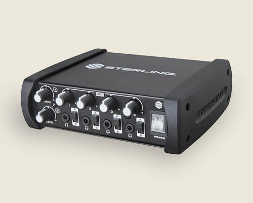 Sterling SHA4 4-channel desktop headphone amplifier left on light background